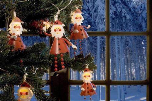 Konstsmide - Lichtsnoer 10 rode kerstmannetjes 230V 20L - warmwit